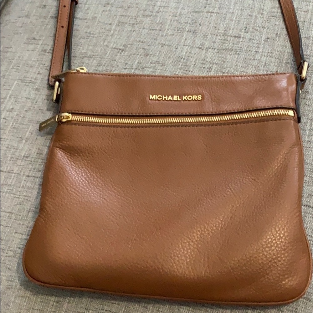 Michael Kors light brown cross body.